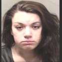 Woman agrees to plea deal in child battery case