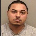 Man from Normal charged with armed robbery after beating