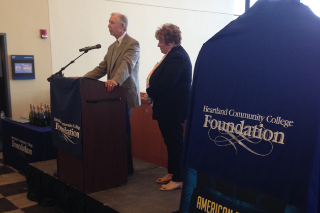 Campaign chairmen Alan Chapman and Julie Dobski announce the results of Heartland Community College's "American Dreams: Local Results" campaign Thursday. (Joe Ragusa/WJBC)