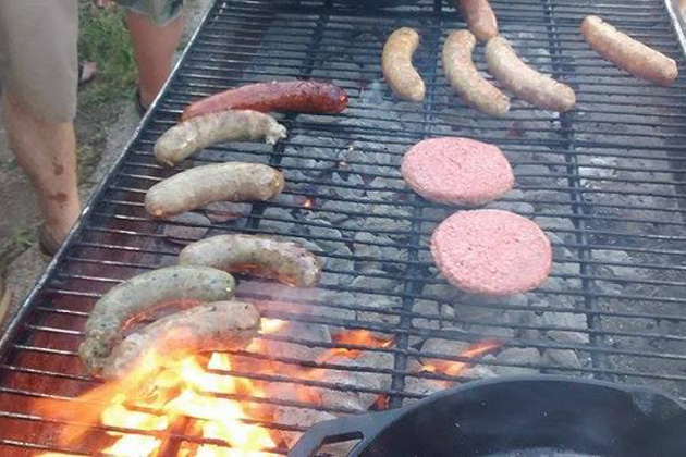 Burgers and brats on the grill