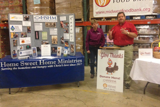 Carolann Carara of Home Sweet Home Ministries and Mike Hoffman with the Midwest Food Bank discuss the "Give Thanks 2015" campaign. (Photo by Joe Ragusa/WJBC)