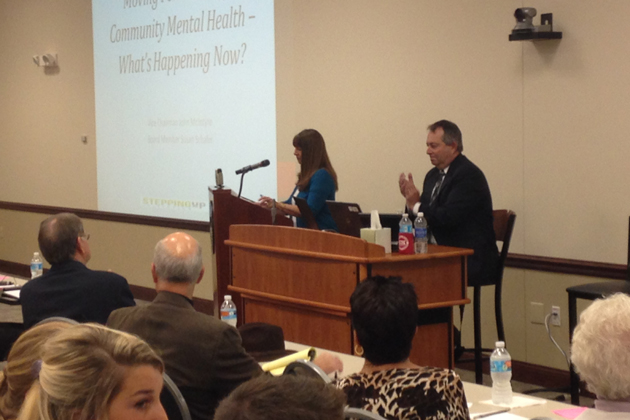 McLean County Board member Susan Schafer and McLean County Administrator Bill Wasson present their update on mental health in the county Monday at the ISU Alumni Center. (Photo by Joe Ragusa/WJBC)