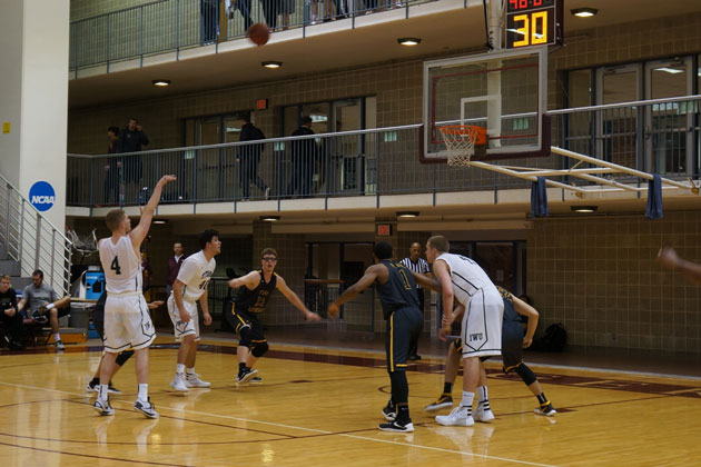 Junior guard Andy Stempel shoots a free throw during Illinois Wesleyan's 92-86 victory over Texas Lutheran Saturday afternoon. (Eric Stock/WJBC)