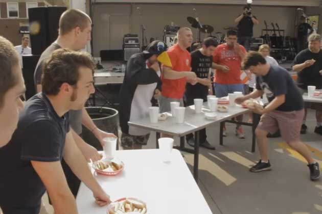 A hot dot eating contest will be included in the third annual Rock the Block in Normal on April 23. (Photo courtesy YouTube/United Way McLean County)